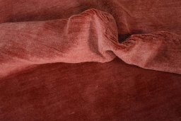 Corner detail of New Persian Gabbeh rug showing border pattern and Wool pile