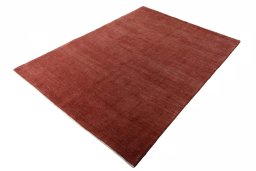 Corner detail of New Persian Gabbeh rug showing border pattern and Wool pile