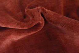 Corner detail of New Persian Gabbeh rug showing border pattern and Wool pile