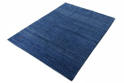 Corner detail of New Persian Gabbeh rug showing border pattern and Wool pile