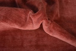 Corner detail of New Persian Gabbeh rug showing border pattern and Wool pile