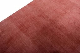 Backside of handmade New Persian Gabbeh rug showing knot structure and weave density