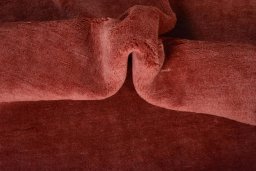 Corner detail of New Persian Gabbeh rug showing border pattern and Wool pile
