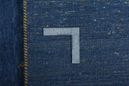 Close-up detail of New Persian Gabbeh rug from Iran / Persia showing Wool weave
