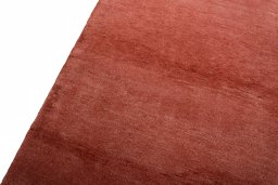 Backside of handmade New Persian Gabbeh rug showing knot structure and weave density