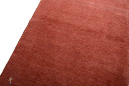 Backside of handmade New Persian Gabbeh rug showing knot structure and weave density