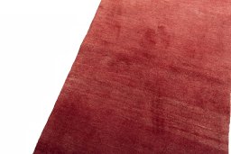 Backside of handmade New Persian Gabbeh rug showing knot structure and weave density