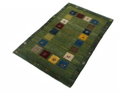 Corner detail of New Persian Gabbeh rug showing border pattern and Wool pile
