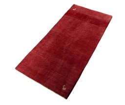 Corner detail of New Persian Gabbeh rug showing border pattern and Wool pile