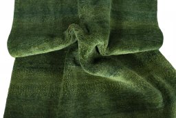 Corner detail of New Persian Gabbeh rug showing border pattern and Wool pile
