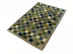 Corner detail of New Persian Gabbeh rug showing border pattern and Wool pile