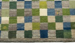Central medallion detail of New Persian Gabbeh rug from Iran / Persia