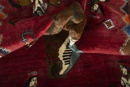 Corner detail of 2000s Persian Gabbeh rug showing border pattern and Wool pile