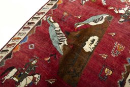 Backside of handmade 2000s Persian Gabbeh rug showing knot structure and weave density