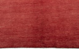 Backside of handmade New Persian Gabbeh rug showing knot structure and weave density