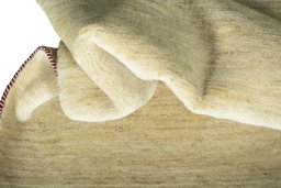 Corner detail of New Persian Gabbeh rug showing border pattern and Wool pile