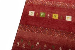 Backside of handmade New Persian Gabbeh rug showing knot structure and weave density