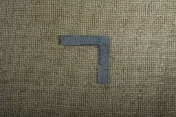 Corner detail of New Persian Gabbeh rug showing border pattern and Wool pile