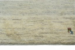 Backside of handmade New Persian Gabbeh rug showing knot structure and weave density