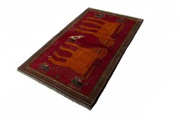 Corner detail of 2000s Persian Gabbeh rug showing border pattern and Wool pile