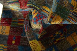 Corner detail of New Persian Gabbeh rug showing border pattern and Wool pile