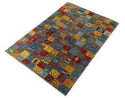 Corner detail of New Persian Gabbeh rug showing border pattern and Wool pile