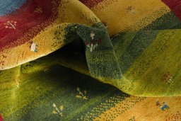 Corner detail of New Persian Gabbeh rug showing border pattern and Wool pile
