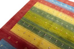 Backside of handmade New Persian Gabbeh rug showing knot structure and weave density