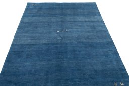 Surface texture of New Persian Gabbeh rug with natural Wool and intricate pattern