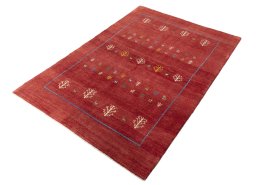 Corner detail of New Persian Gabbeh rug showing border pattern and Wool pile