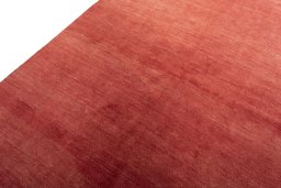 Backside of handmade New Persian Gabbeh rug showing knot structure and weave density