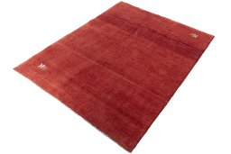 Corner detail of New Persian Gabbeh rug showing border pattern and Wool pile