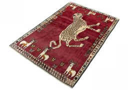 Corner detail of 2000s Persian Gabbeh rug showing border pattern and Wool pile