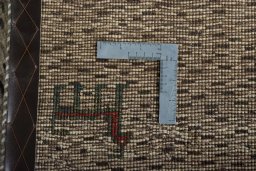 Close-up detail of 2000s Persian Gabbeh rug from Iran / Persia showing Wool weave