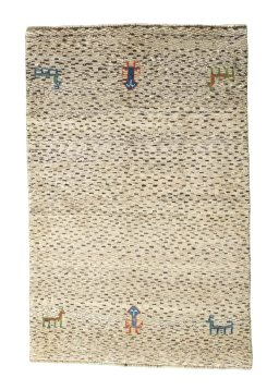 Full view of 2000s Persian Gabbeh rug from Iran / Persia, 145 × 95 cm in Beige tones