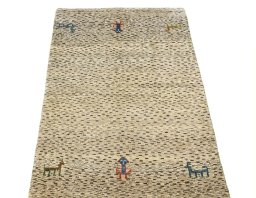 Surface texture of 2000s Persian Gabbeh rug with natural Wool and intricate pattern