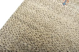 Backside of handmade 2000s Persian Gabbeh rug showing knot structure and weave density