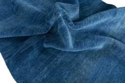 Corner detail of New Persian Gabbeh rug showing border pattern and Wool pile