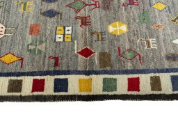 Close-up detail of 2000s Persian Gabbeh rug from Iran / Persia showing Wool weave