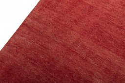 Backside of handmade New Persian Gabbeh rug showing knot structure and weave density