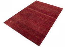 Corner detail of New Persian Gabbeh rug showing border pattern and Wool pile