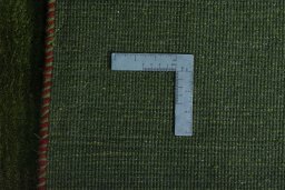 Close-up detail of New Persian Gabbeh rug from Iran / Persia showing Wool weave