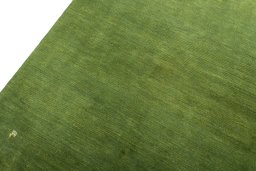 Backside of handmade New Persian Gabbeh rug showing knot structure and weave density