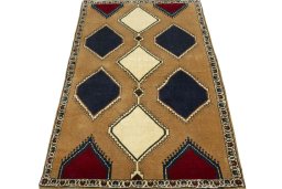 Surface texture of 2000s Persian Gabbeh rug with natural Wool and intricate pattern
