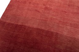 Backside of handmade New Persian Gabbeh rug showing knot structure and weave density