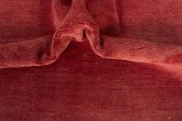 Corner detail of New Persian Gabbeh rug showing border pattern and Wool pile