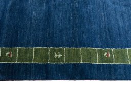 Close-up detail of New Persian Gabbeh rug from Iran / Persia showing Wool weave