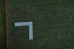 Close-up detail of New Persian Gabbeh rug from Iran / Persia showing Wool weave