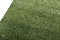 Backside of handmade New Persian Gabbeh rug showing knot structure and weave density