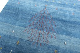 Backside of handmade New Persian Gabbeh rug showing knot structure and weave density